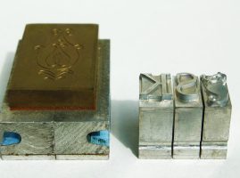 Prägestempel und Bleilettern